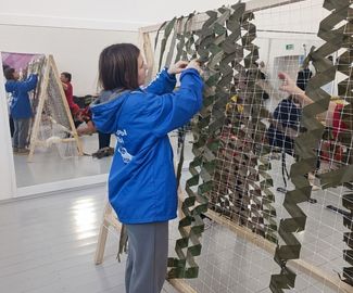 Зарайских активистов обучили плетению маскировочных сетей